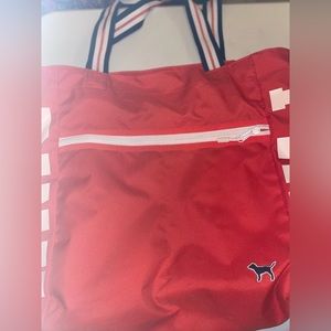 Reddish orange tote with navy blue